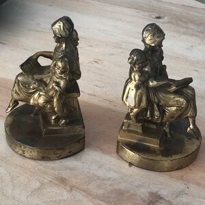 Antique brass bookends.